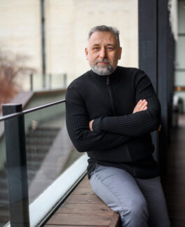 mature-man-sitting-sill (1)