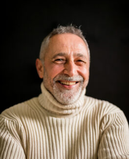 smiling-aged-man-with-grey-hair