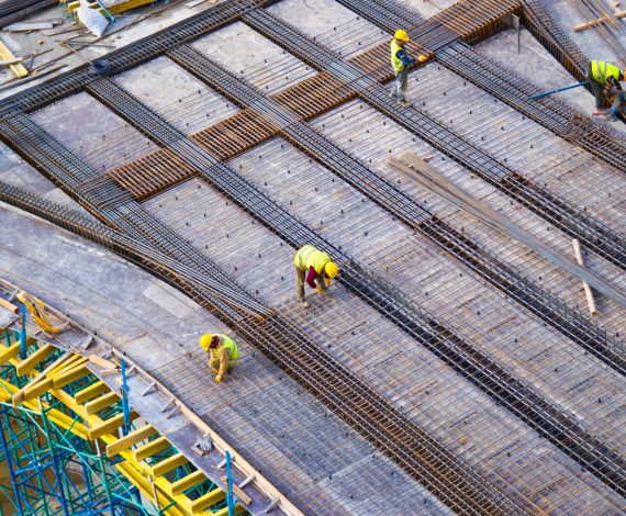workers-putting-metal-structure-construction